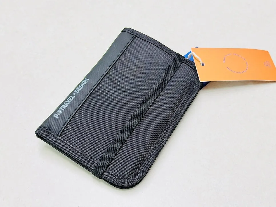 Packly passport wallet holding passports, cards, and more
