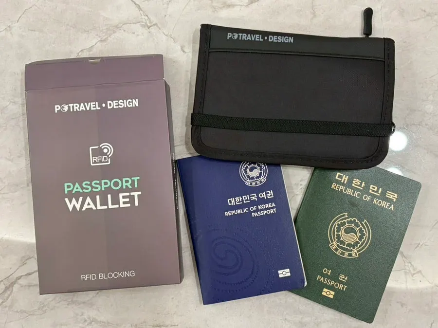 Case holding a passport and hotel key card together