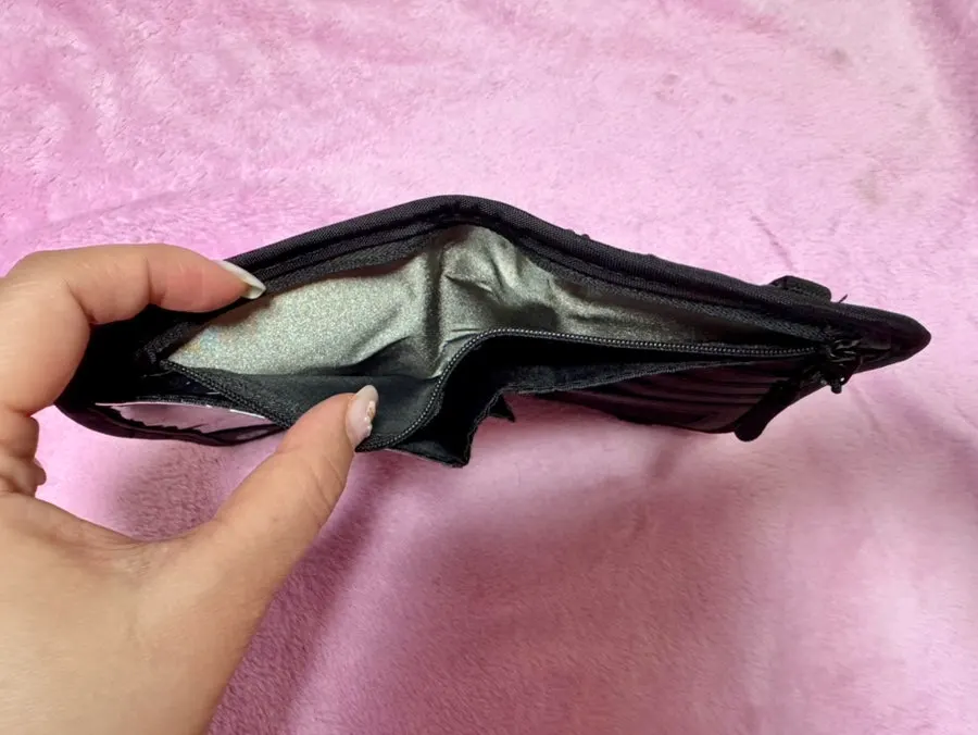 Interior storage layout of the Packly passport wallet