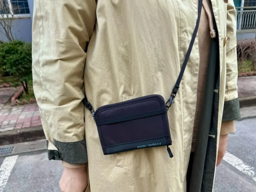 Packly wallet carrying a passport and cash together