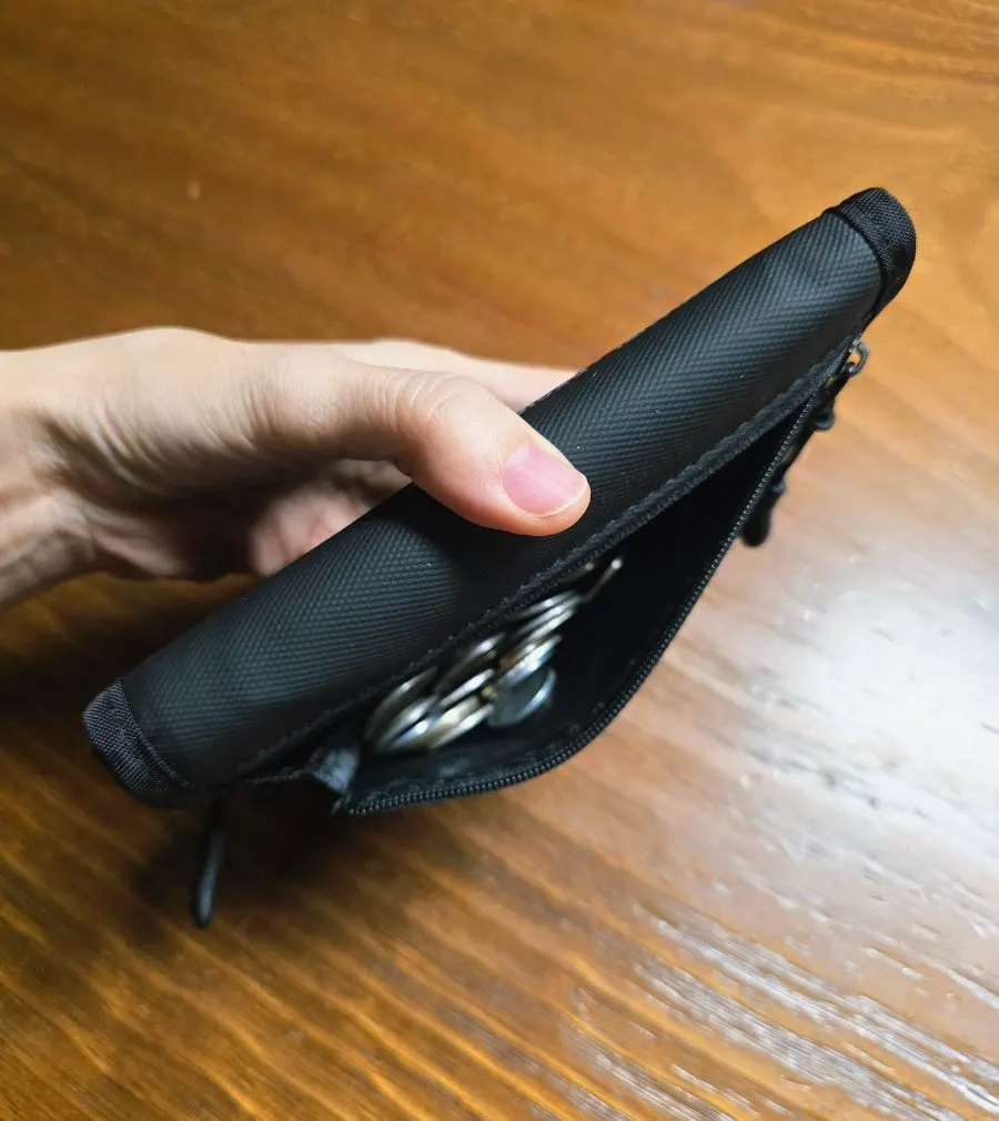 Back pocket of the passport wallet for storing coins