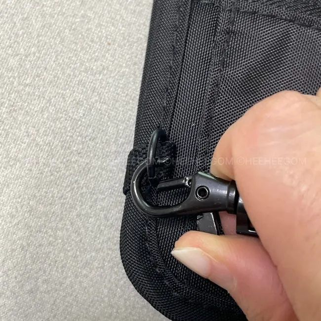 Zip storage pocket and bag layout of the Packly passport wallet