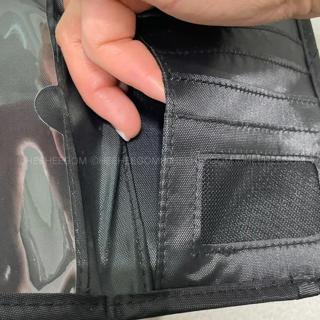 Card and passport storage layout of the Packly passport bag