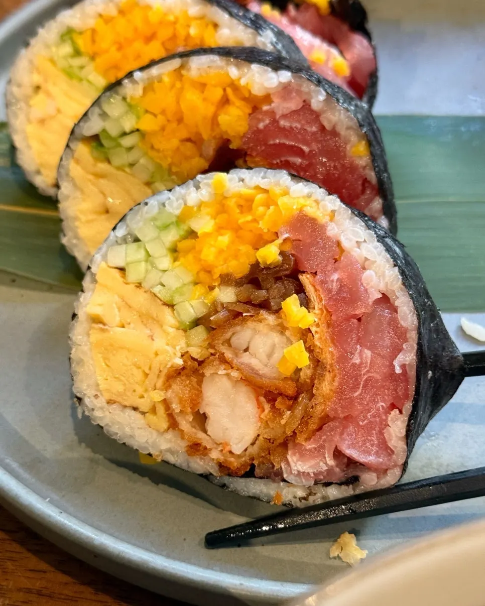 A plate with a large-sized futomaki roll