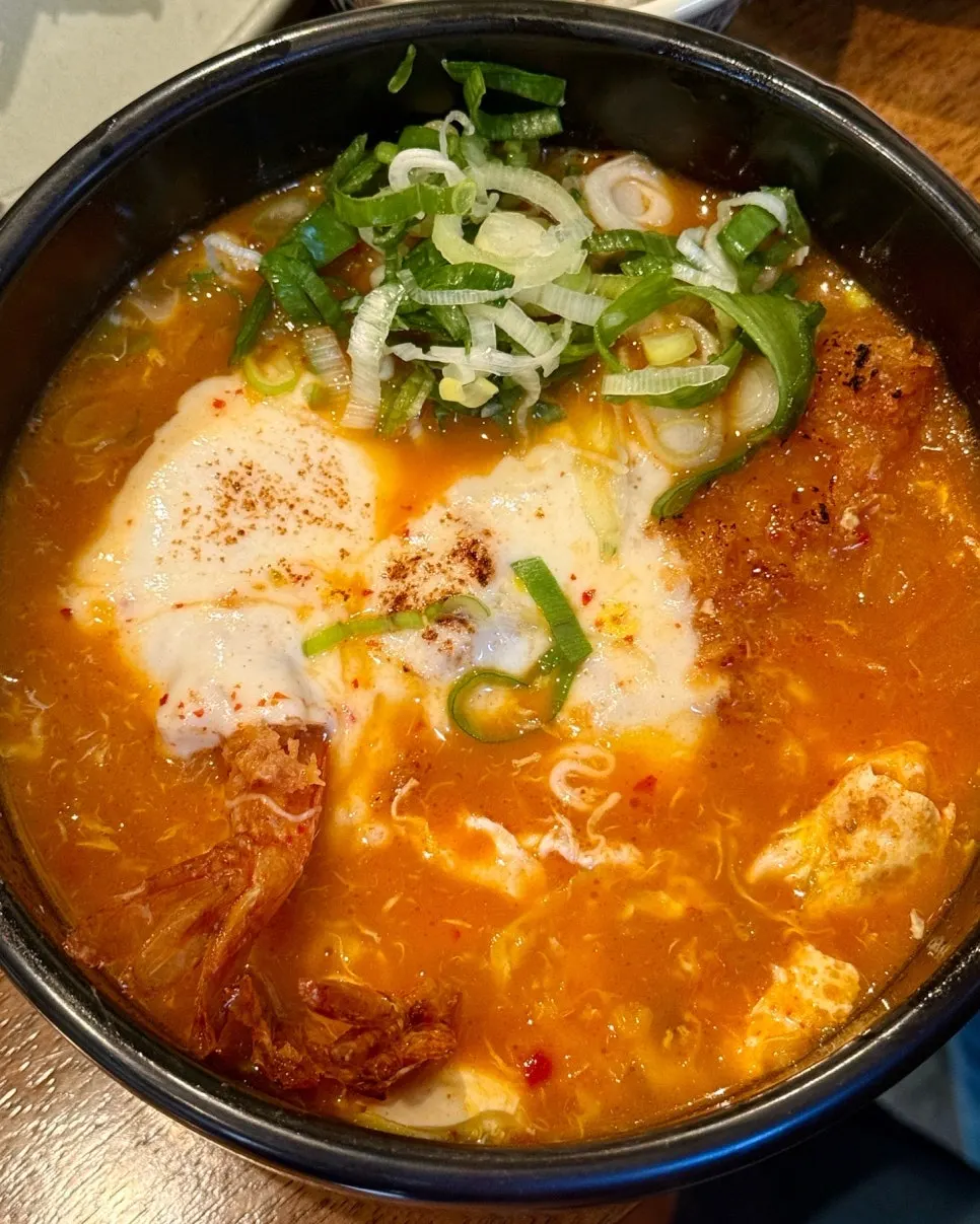 Kimchi cheese nabe topped with torched melted cheese