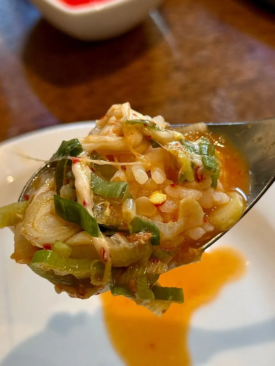Close-up of the clear kimchi broth in the nabe