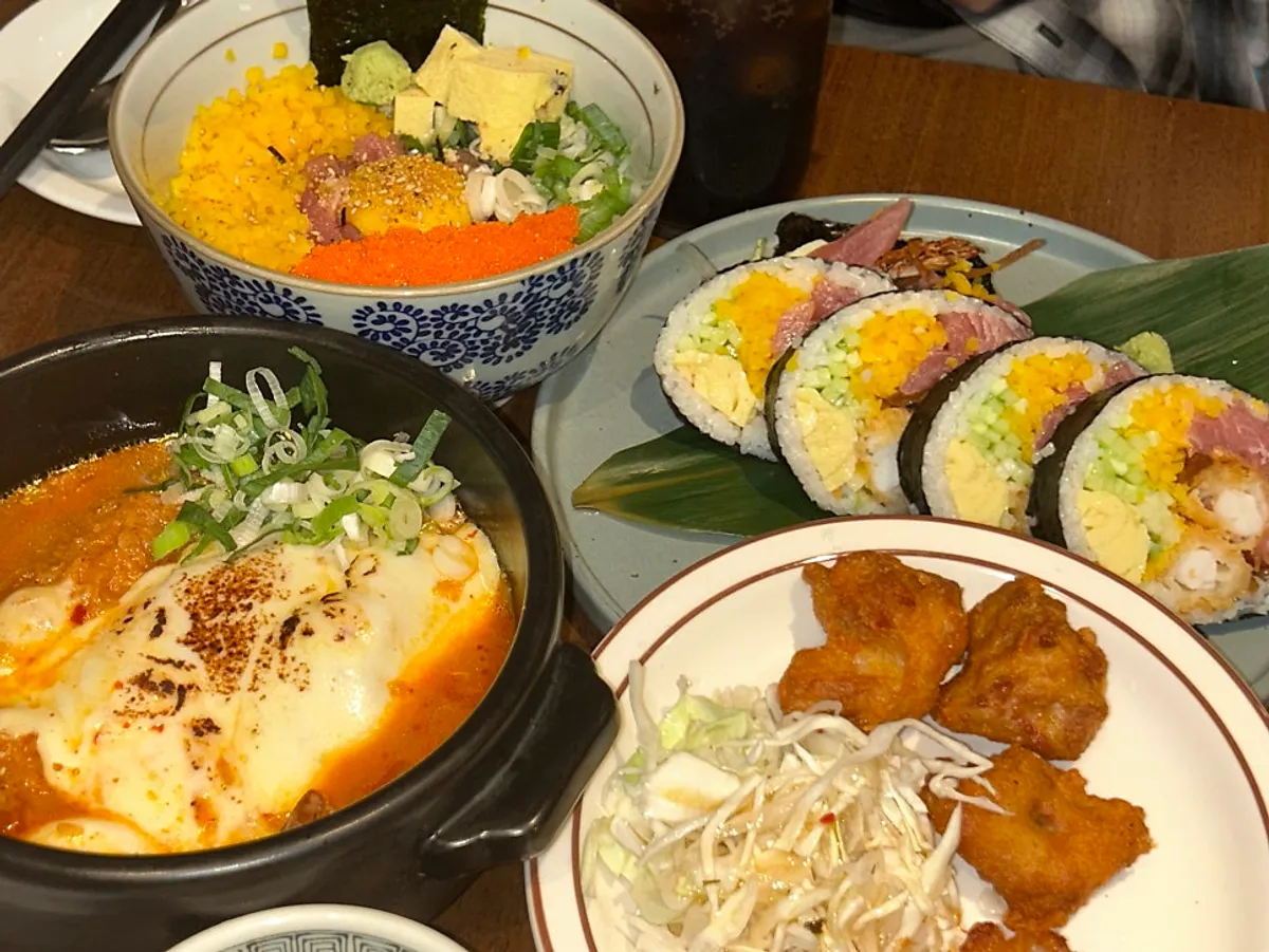 The four dishes ordered at Padong laid out on the table