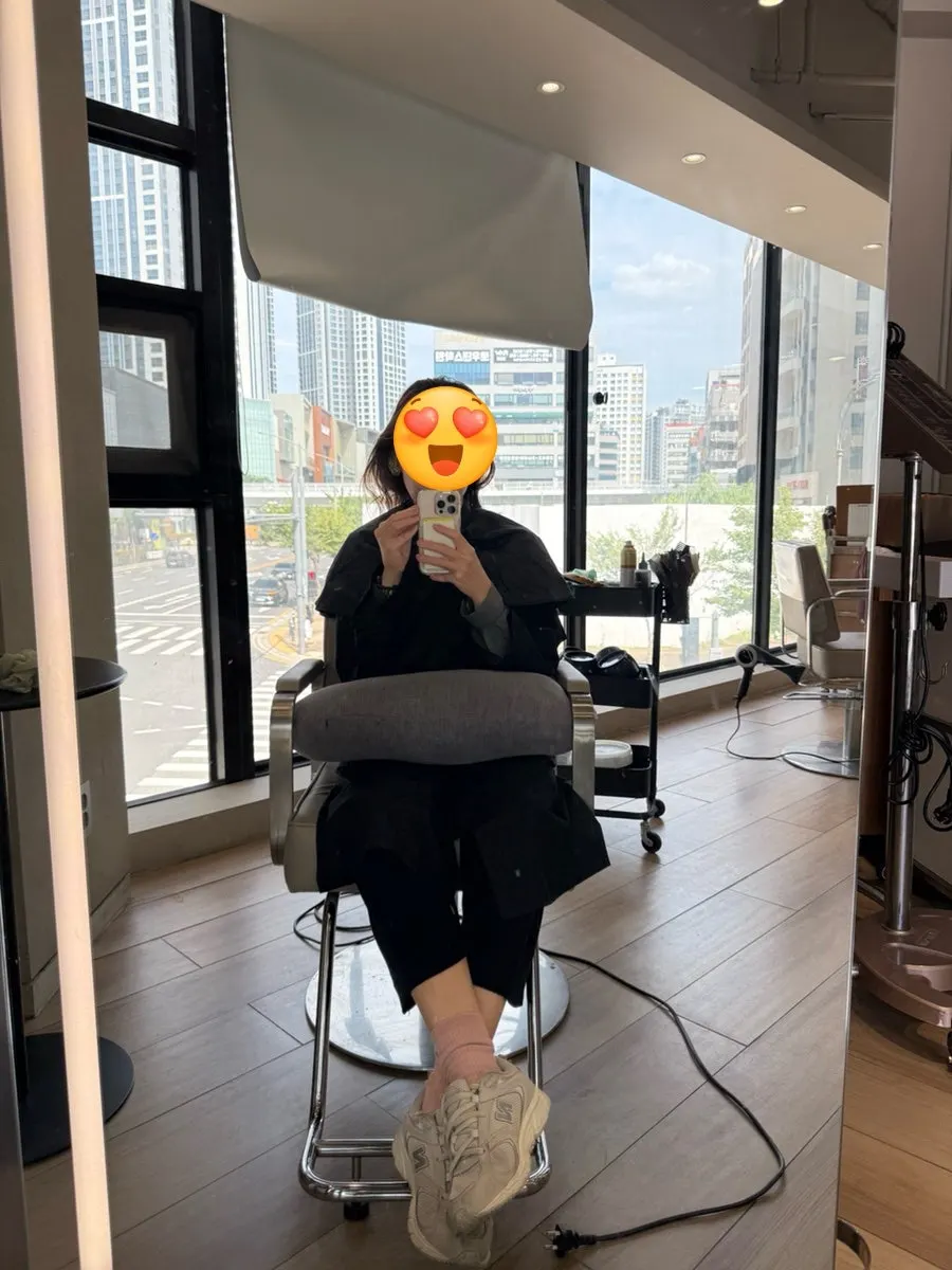 Salon interior with large windows