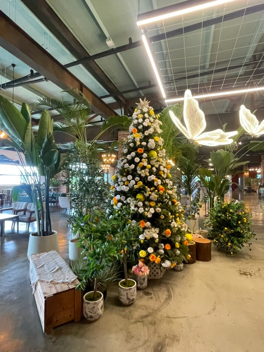 Large flower tree photo zone inside the café