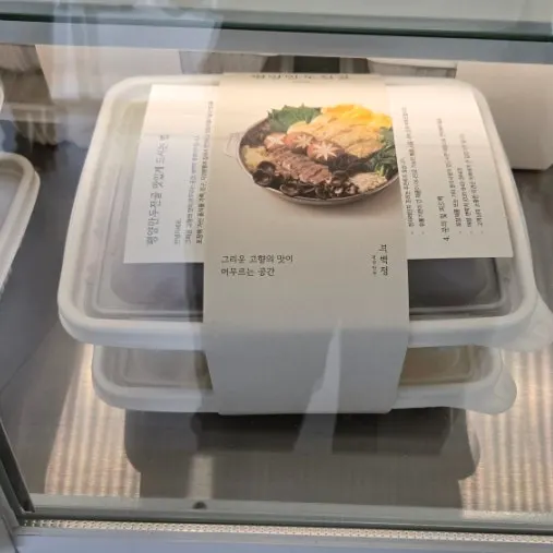 Close-up of packaged takeout mandu products