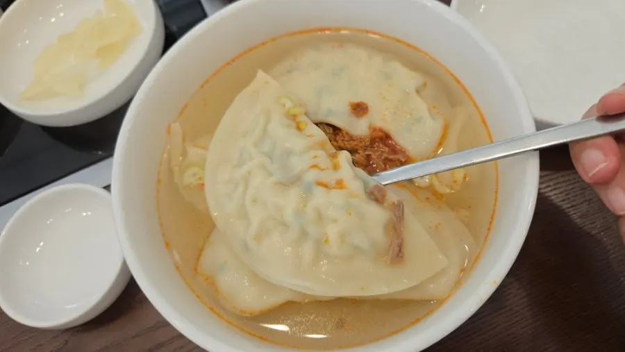 Mandu soup broth with dumplings