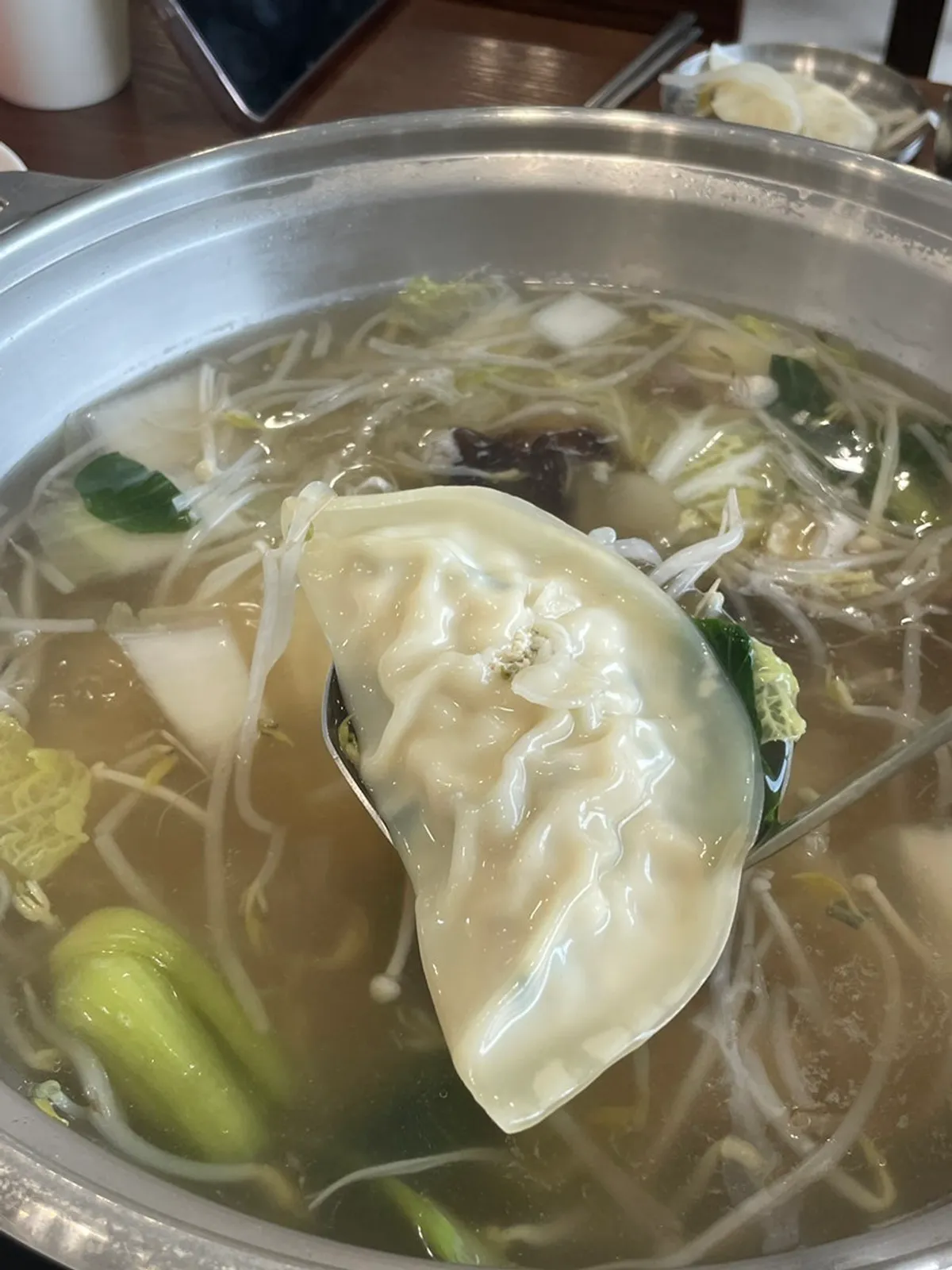 Pyeongyang mandu hot pot at a rolling boil