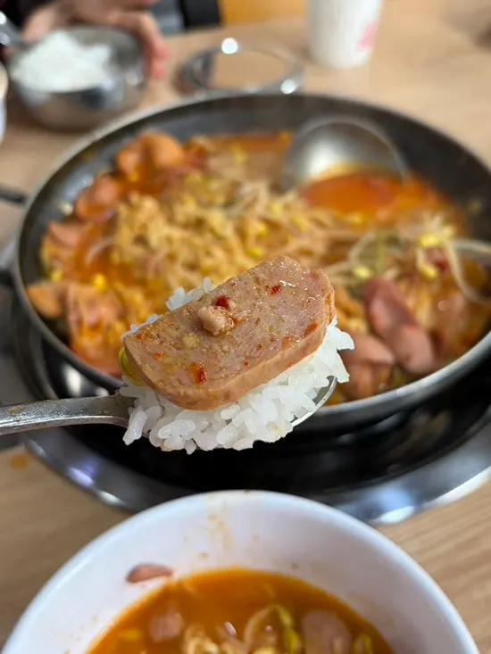 Eating budae jjigae with ramen noodles