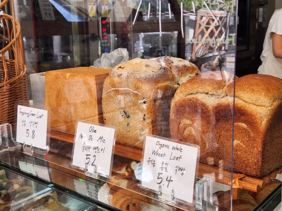 Shelf with freshly baked baguettes
