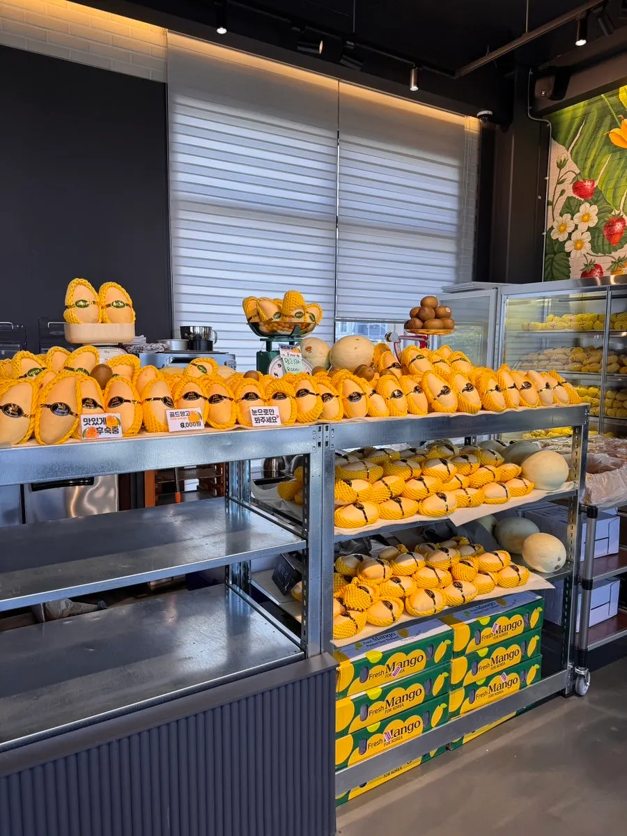 High-ceilinged interior seating at Fruit Forest Paju Direct Store