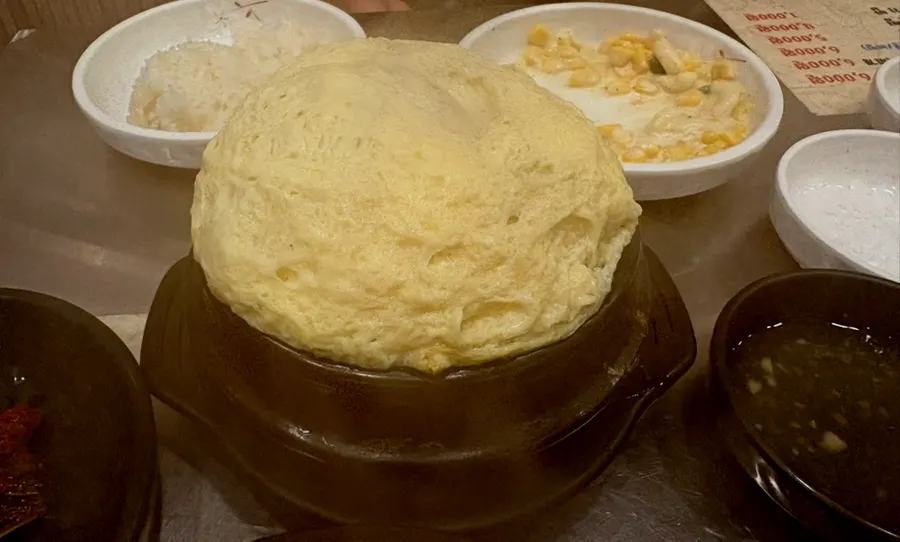 Steamed egg in an earthenware pot