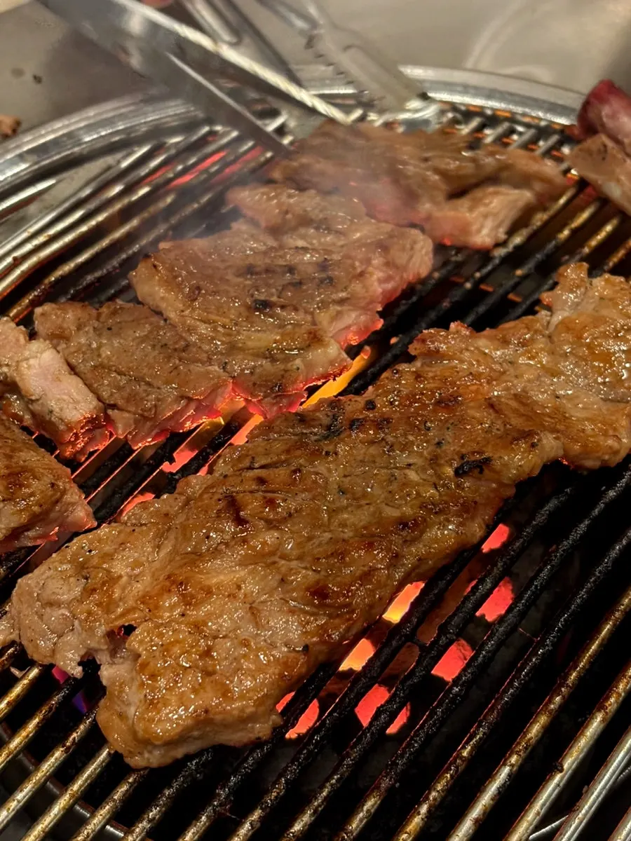 Additional marinated pork ribs served