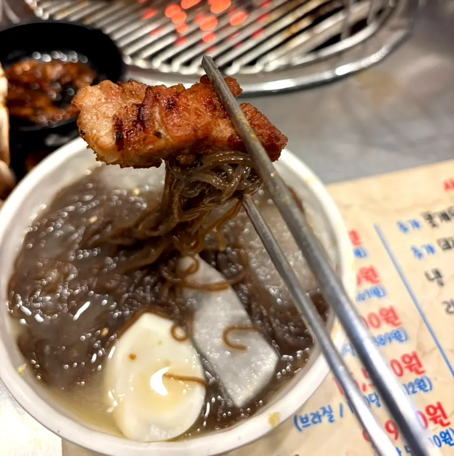 Cold buckwheat noodles wrapped around meat