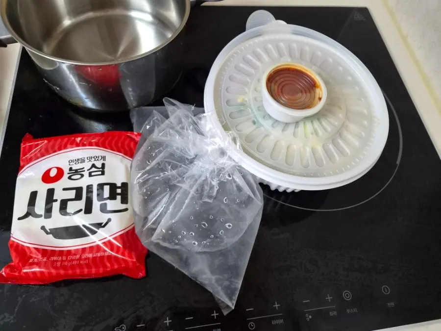 Carefully packed budae jjigae takeout container