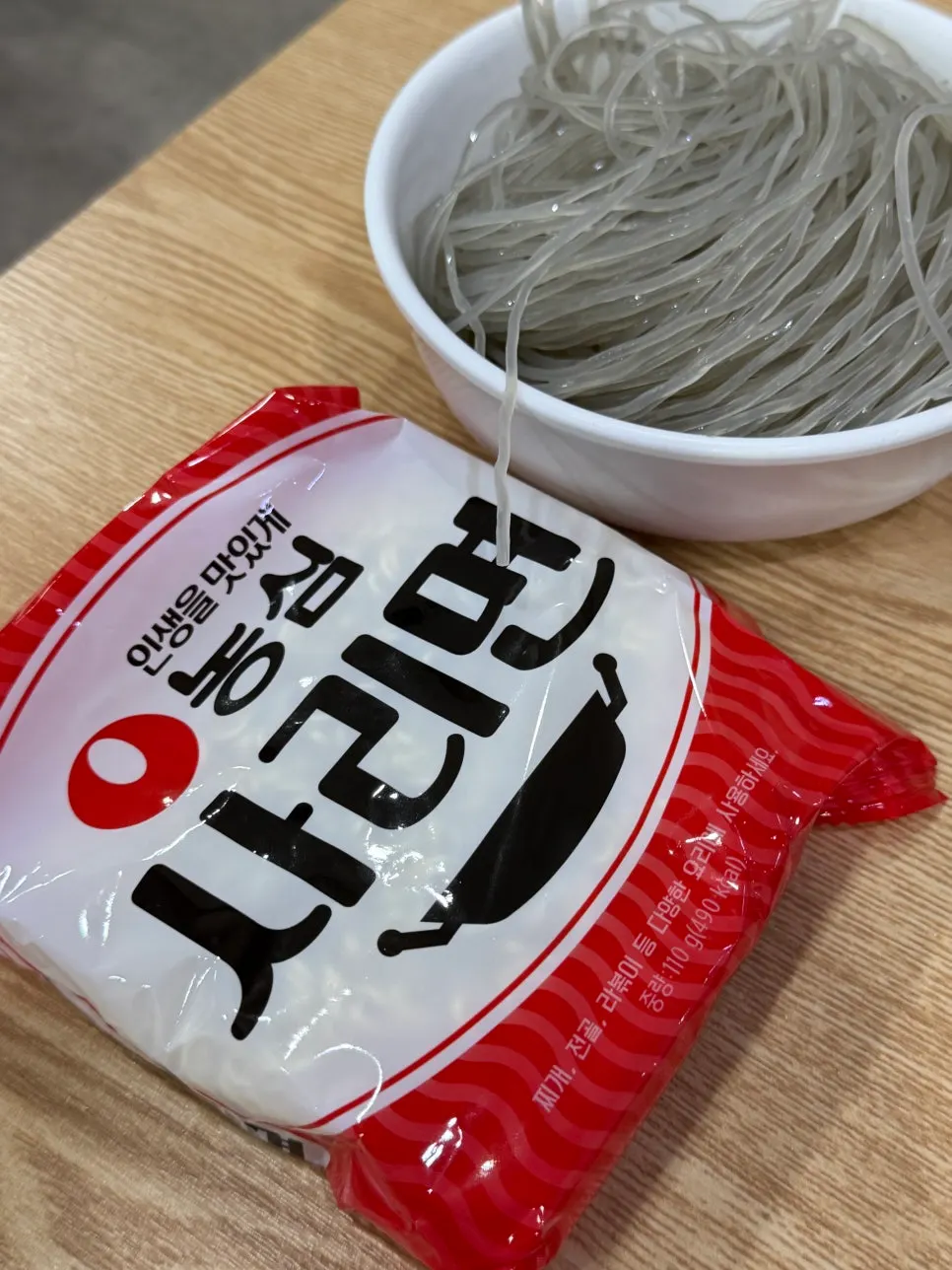 Glass noodle sari added to the budae jjigae