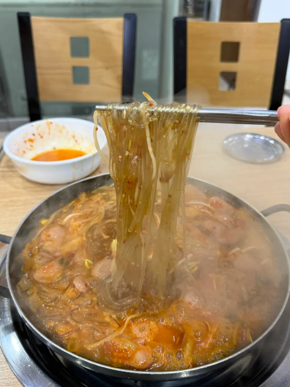 Glass noodles soaked in the broth