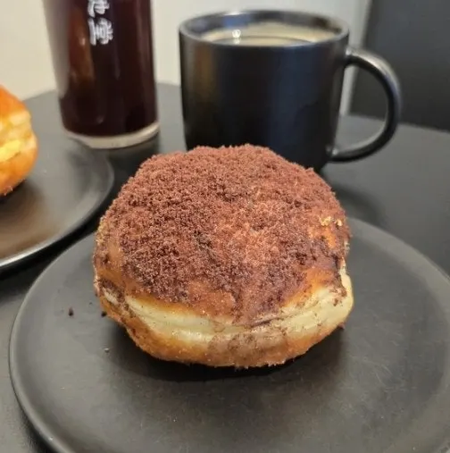 Two types of doughnuts on the table at Heuksadang