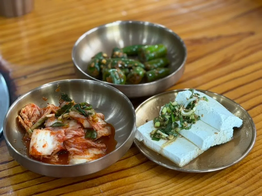 Doenjang peppers, kimchi, and handmade tofu basic side dishes