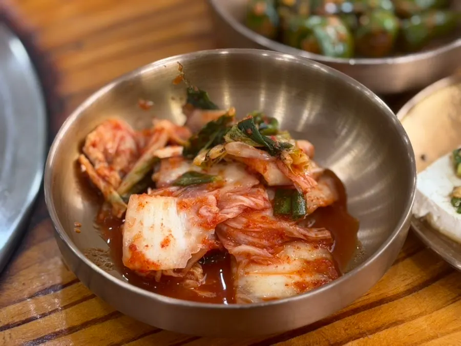 Side dish plates at Cheonje Guksu