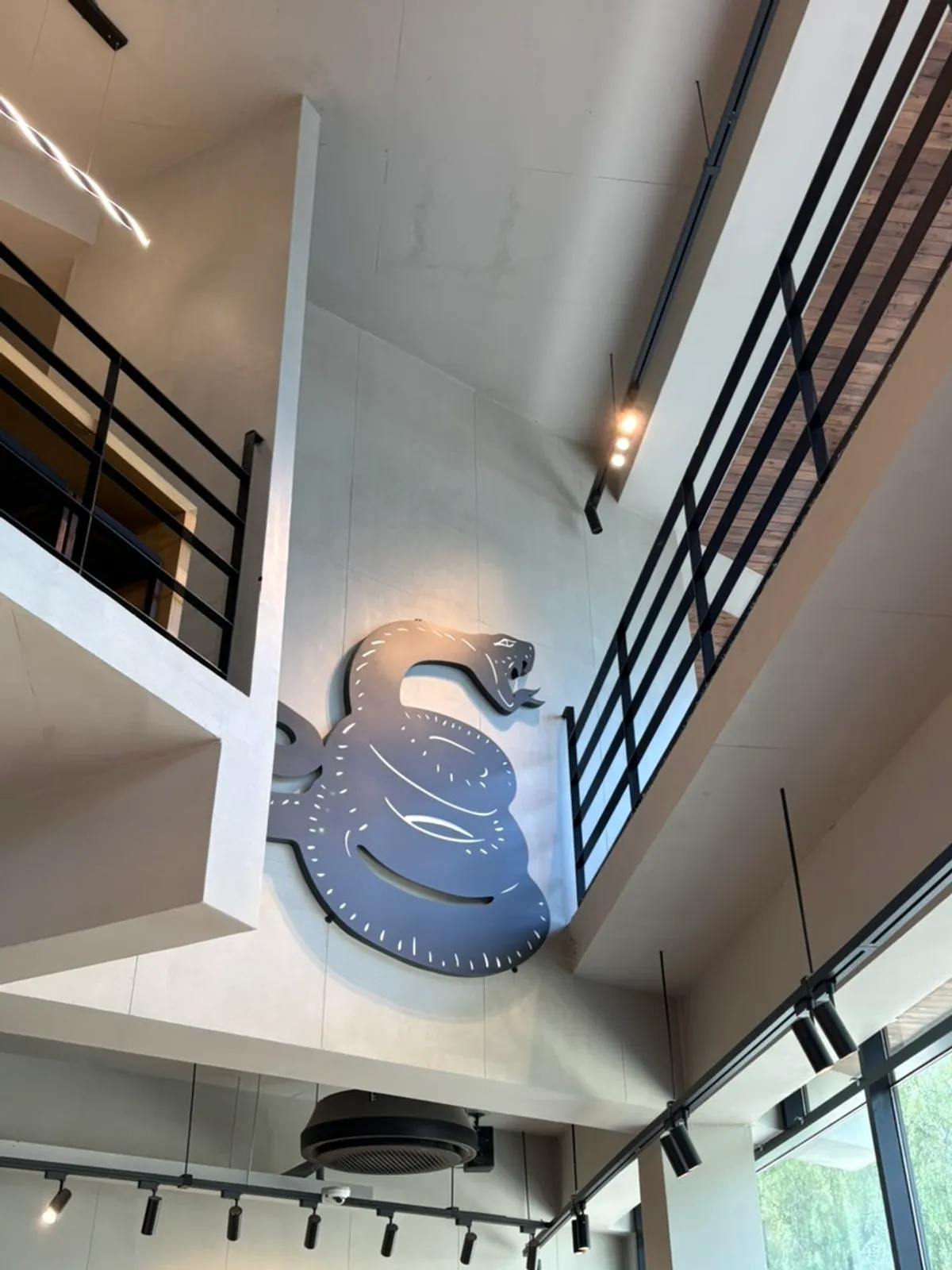 Inner 1st-floor table with the Heuksadang mascot painted above it