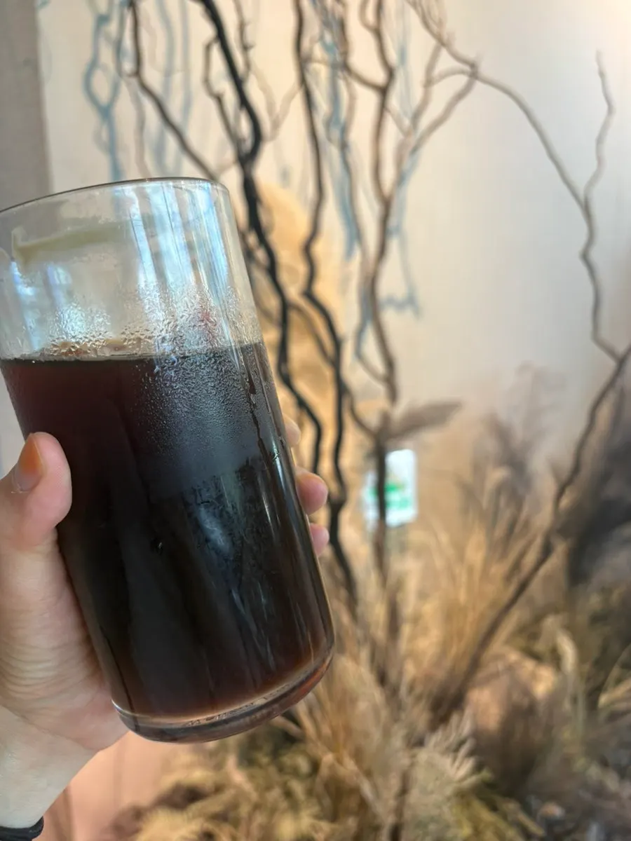 Iced Americano enjoyed alongside the doughnuts
