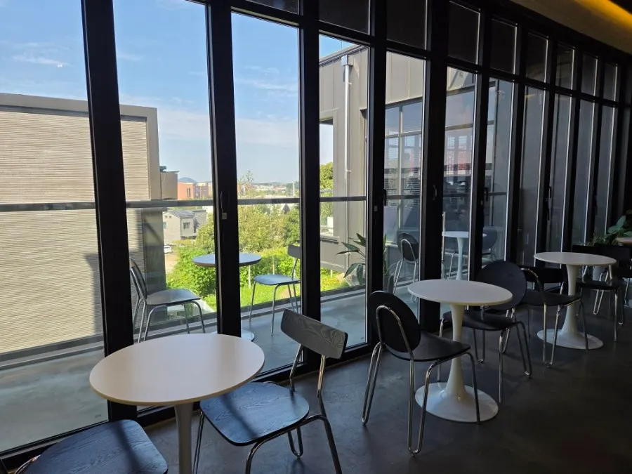 Spacious, clean café tables inside the store