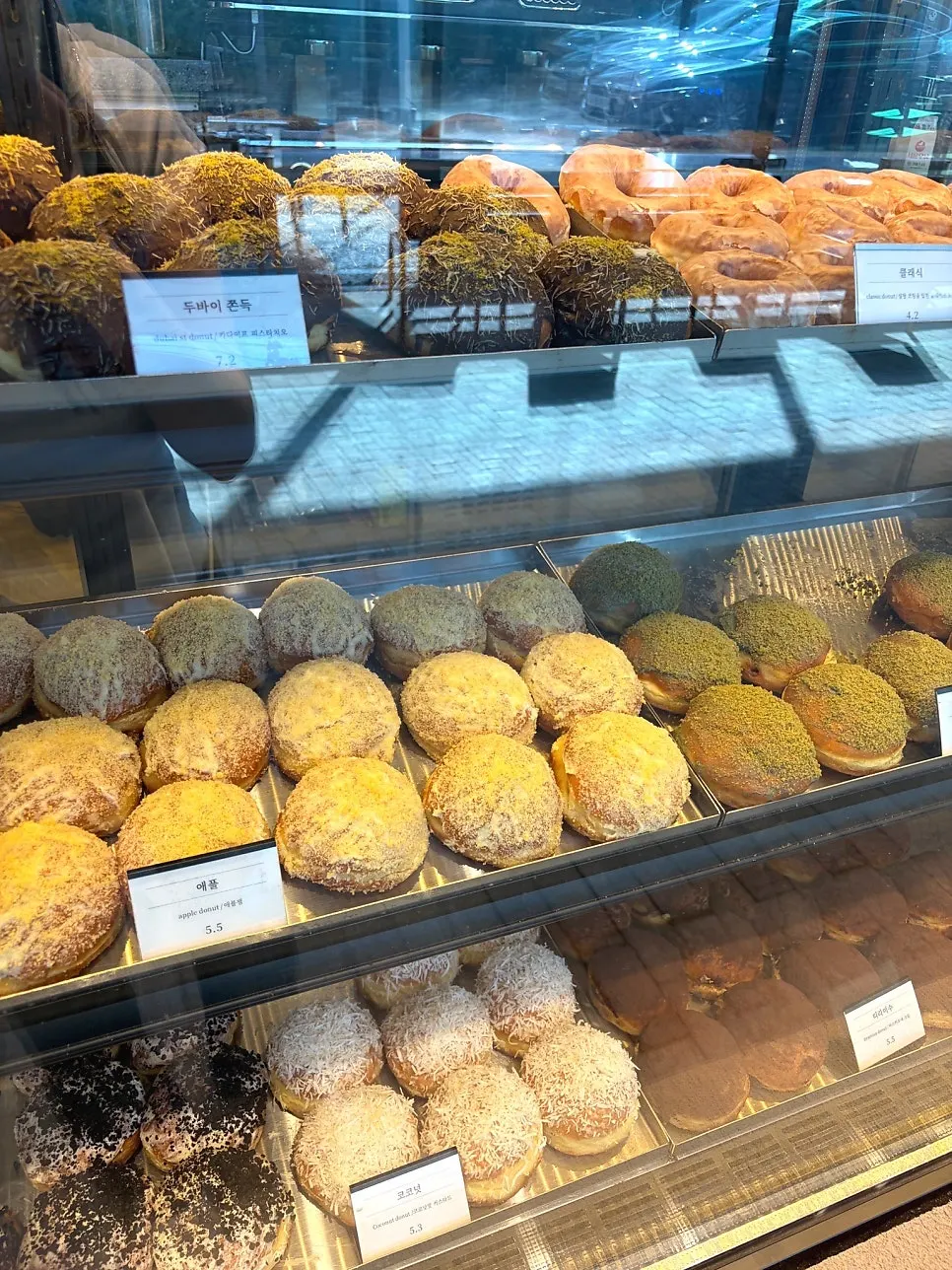 Display case of handmade doughnuts at Heuksadang