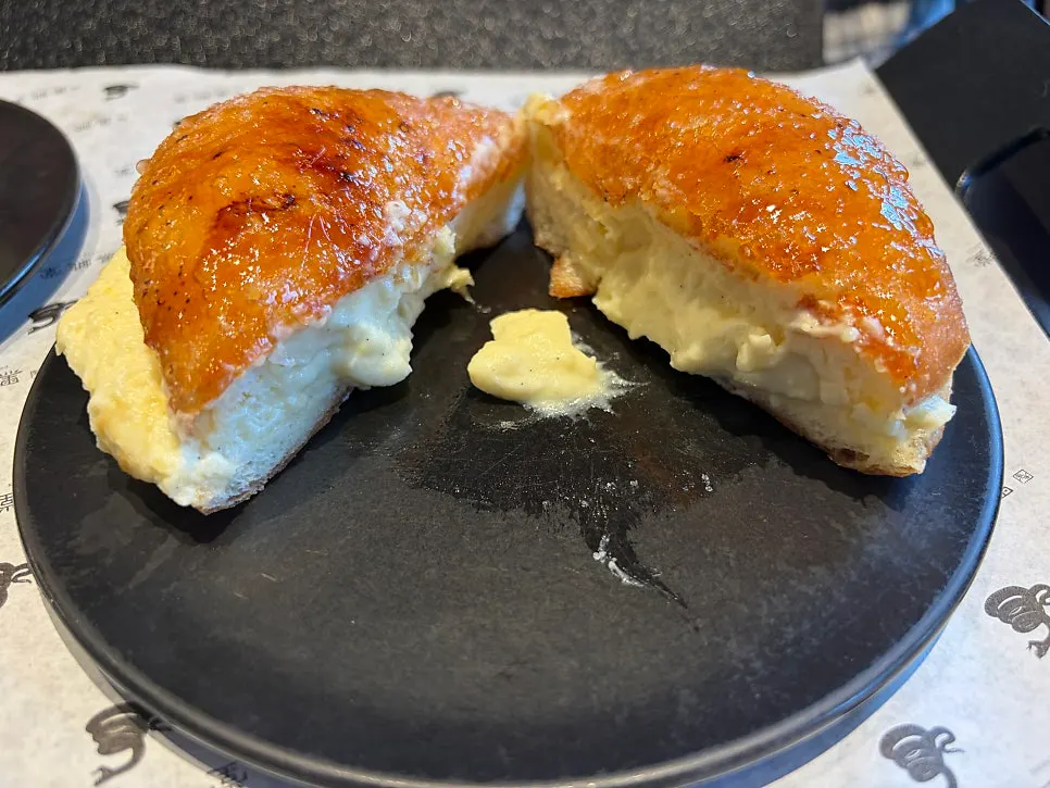 Cross-section of the crème brûlée doughnut showing custard filling