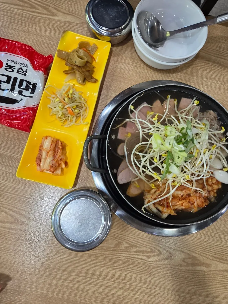 Menu board listing types of budae jjigae