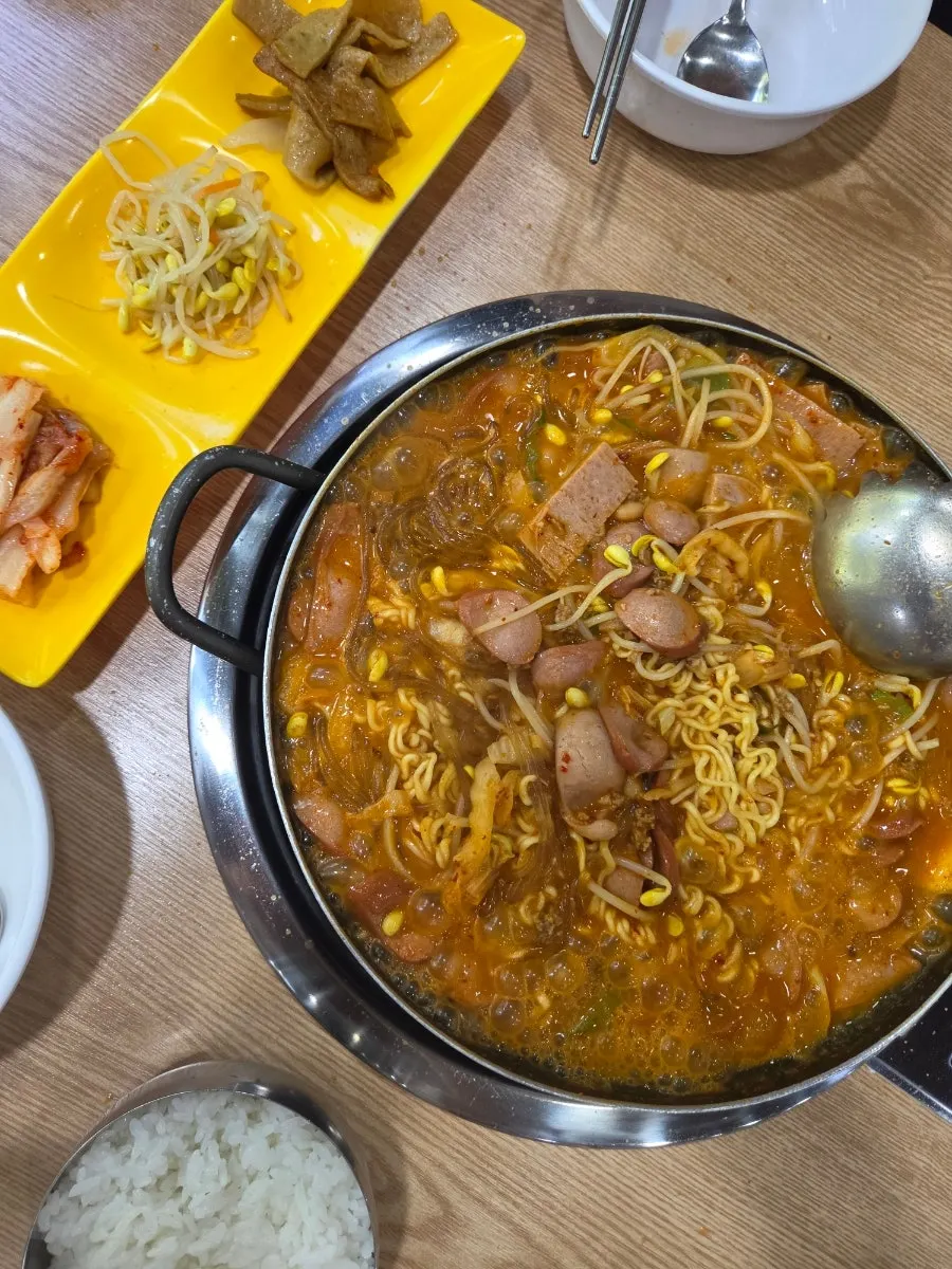 Ramyeon noodles cooked in the budae jjigae broth