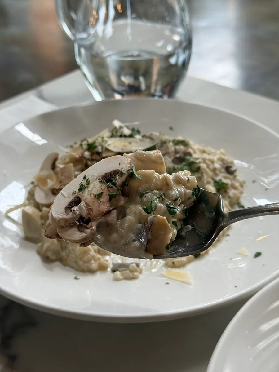 Table set with scallop oil pasta