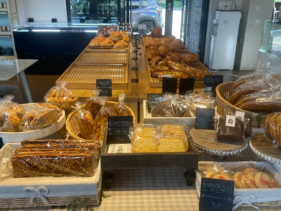 Tarts and cookies displayed at the bakery corner