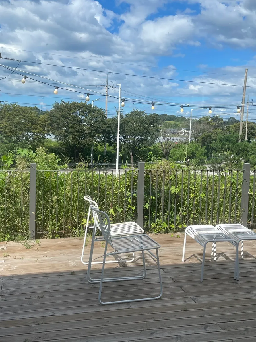 Well-decorated outdoor café area at On the Rail