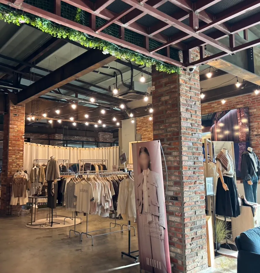 Shop-in-shop area selling clothes and small accessories