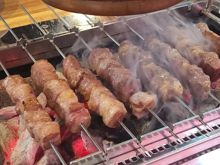 Fully cooked lamb skewers plated