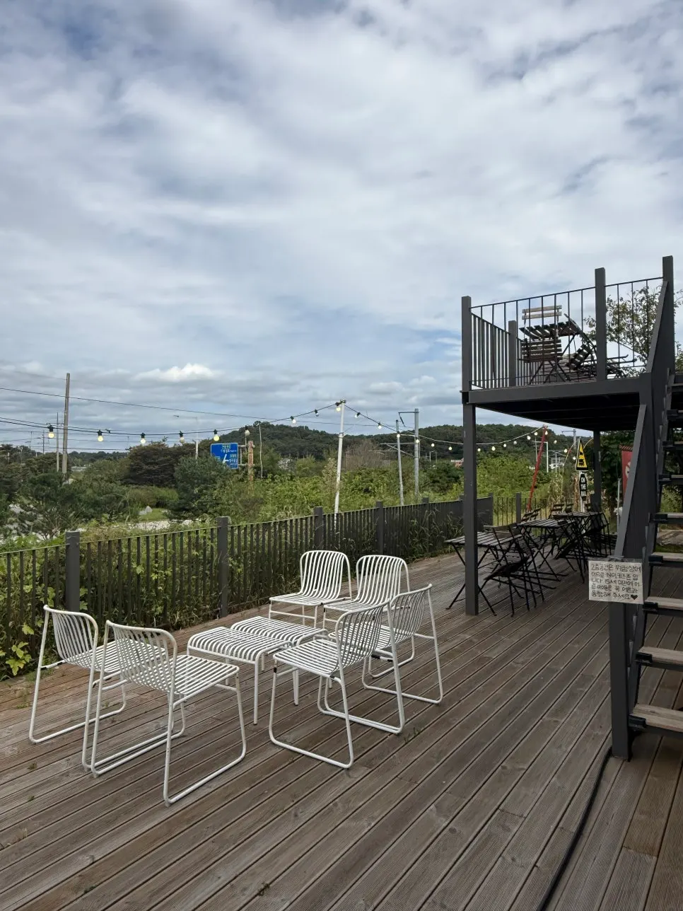 Table seating among the garden at On the Rail