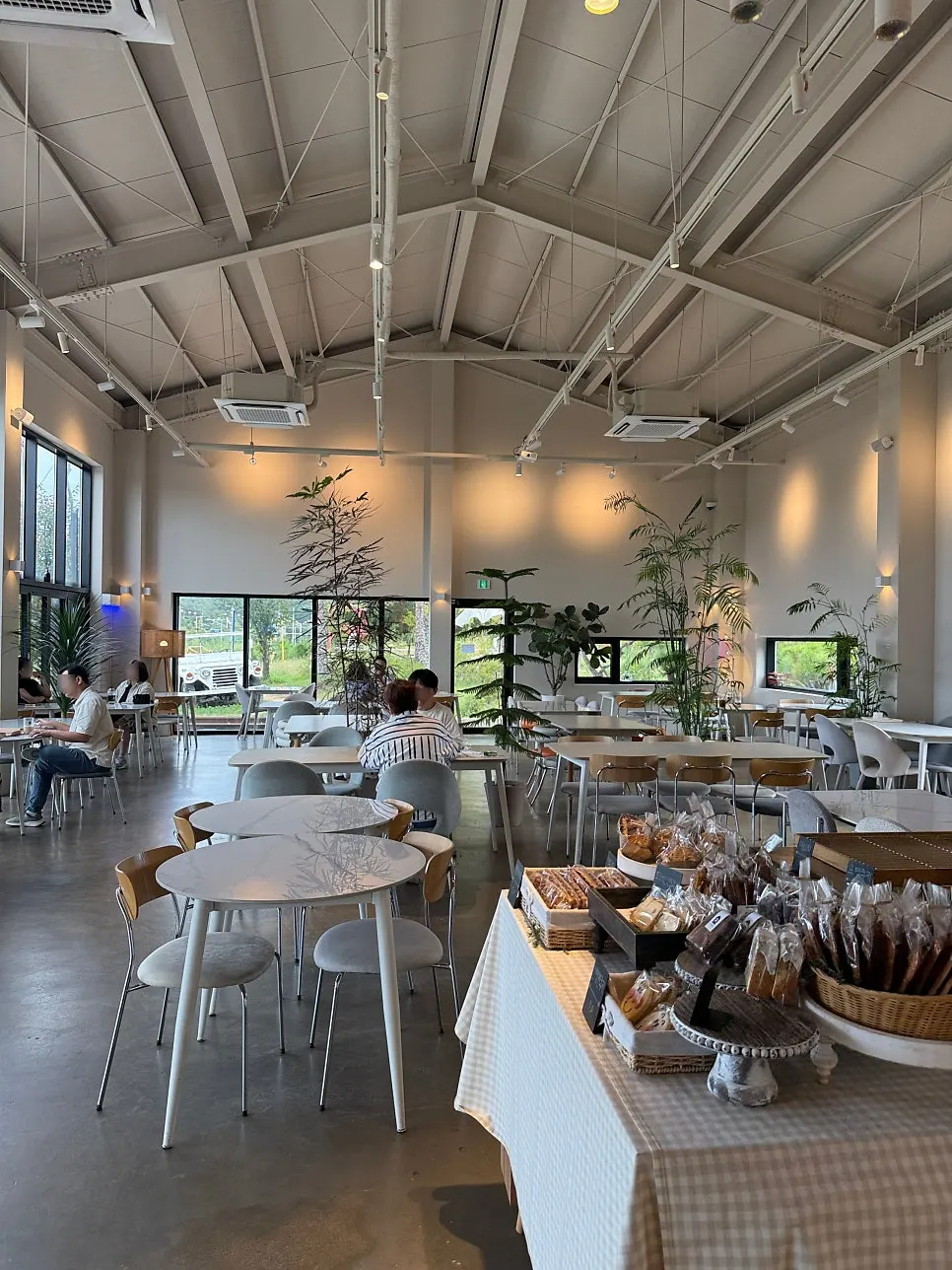 White-toned indoor seating at On the Rail