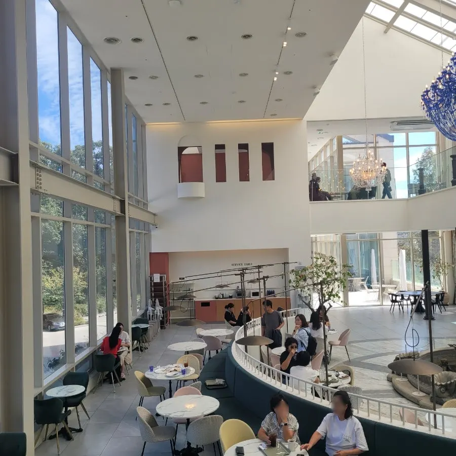 3rd floor seating area with chandelier