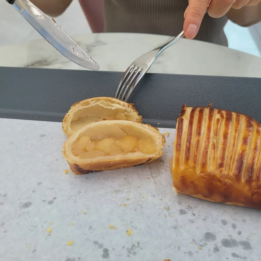 Cross-section of the apple pie packed with apples