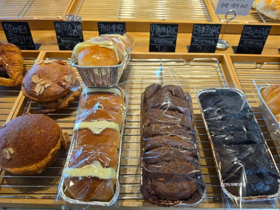 Variety of breads on On the Rail's bakery display