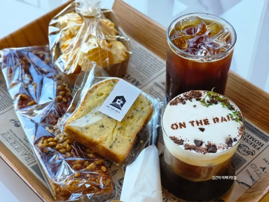 Café table filled with bread and drinks