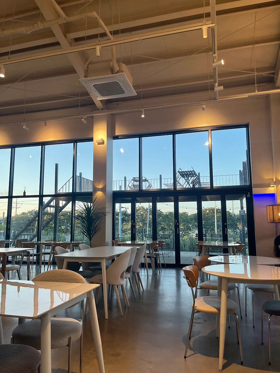 Interior view of the café with outdoor seating visible