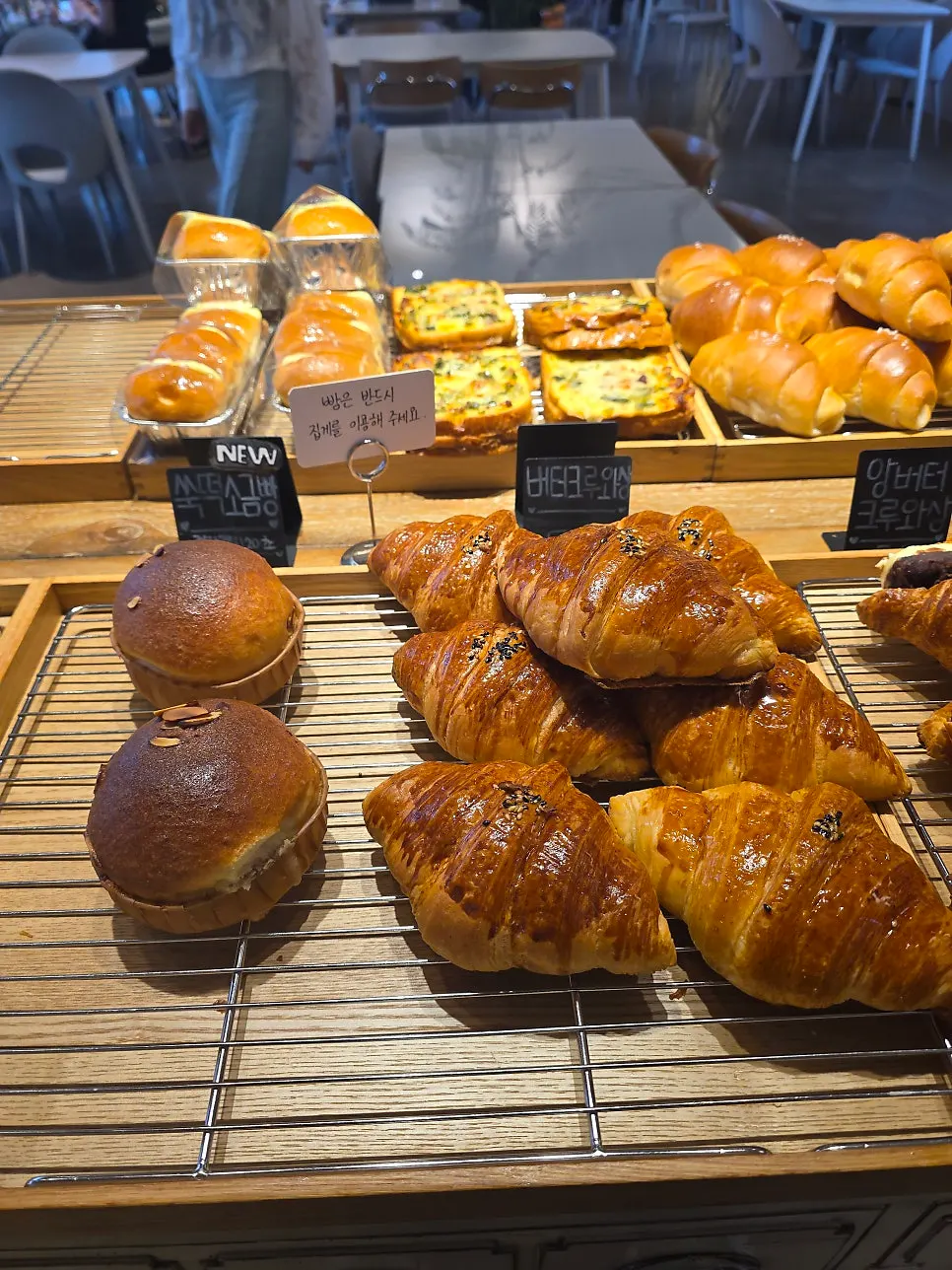 White roll and croissants on display at On the Rail