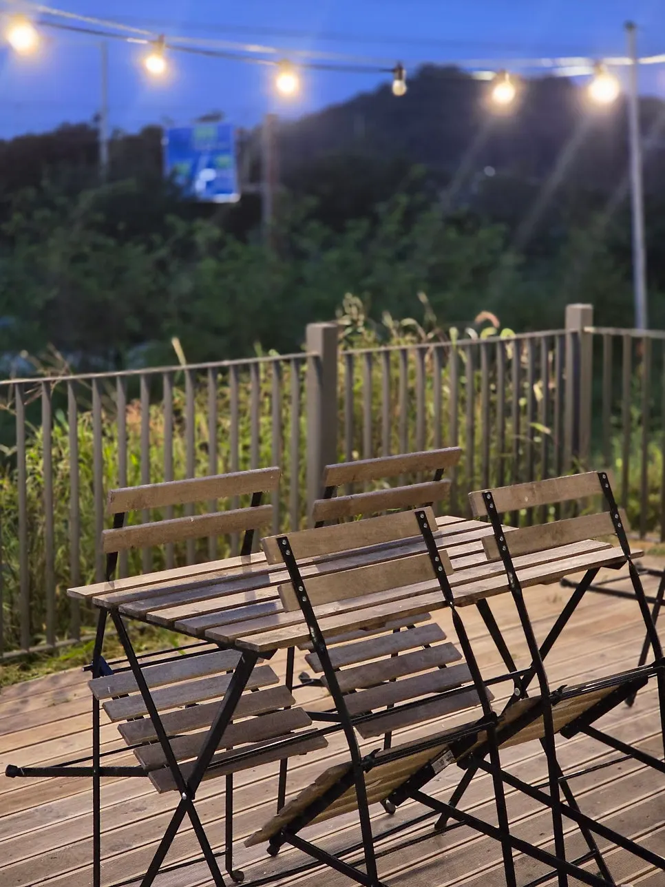 On the Rail's outdoor garden lit up at night