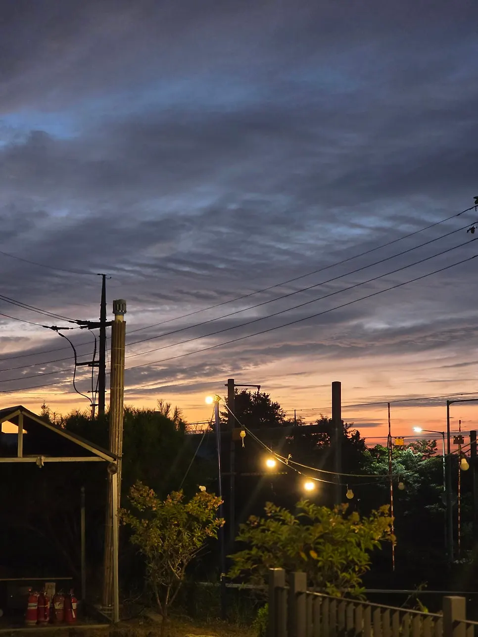 Night view of On the Rail's outdoor garden after dark